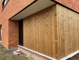 EWL woningbouw - project - nieuwbouw - aannemer - gevelbekleding - houtafwerking - bekleding garagepoort